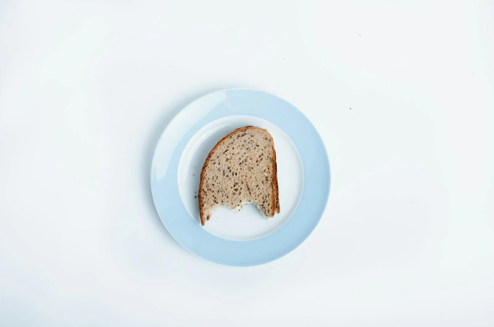 brown bread on white ceramic plate