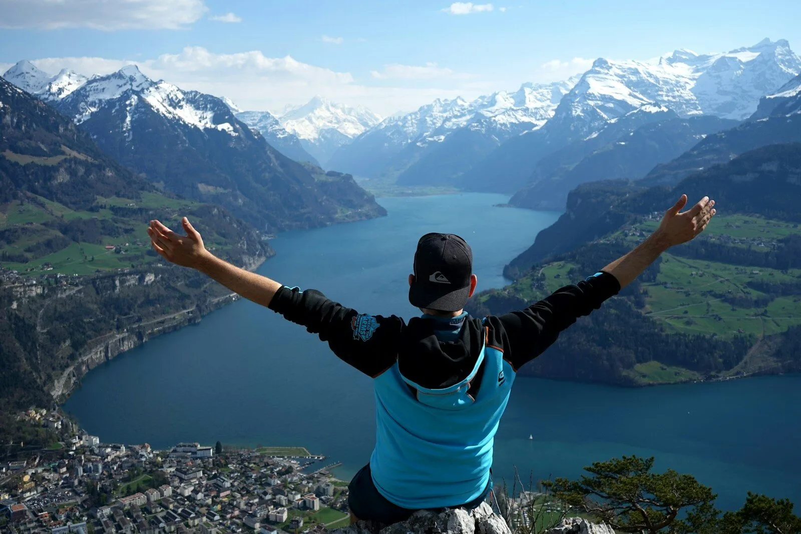man on top of mountain