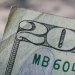 a close up of a twenty dollar bill